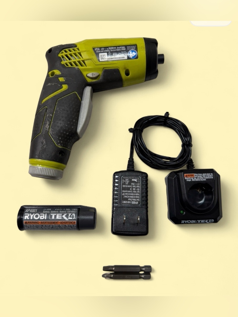 RYOBI HP54L 4V Cordless Electric Screwdriver in Lime Green with battery/charger.